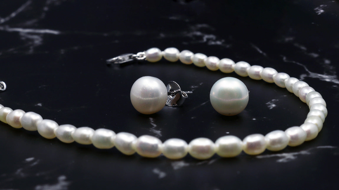 Empowered Pearl Collection strand necklace and stud earrings