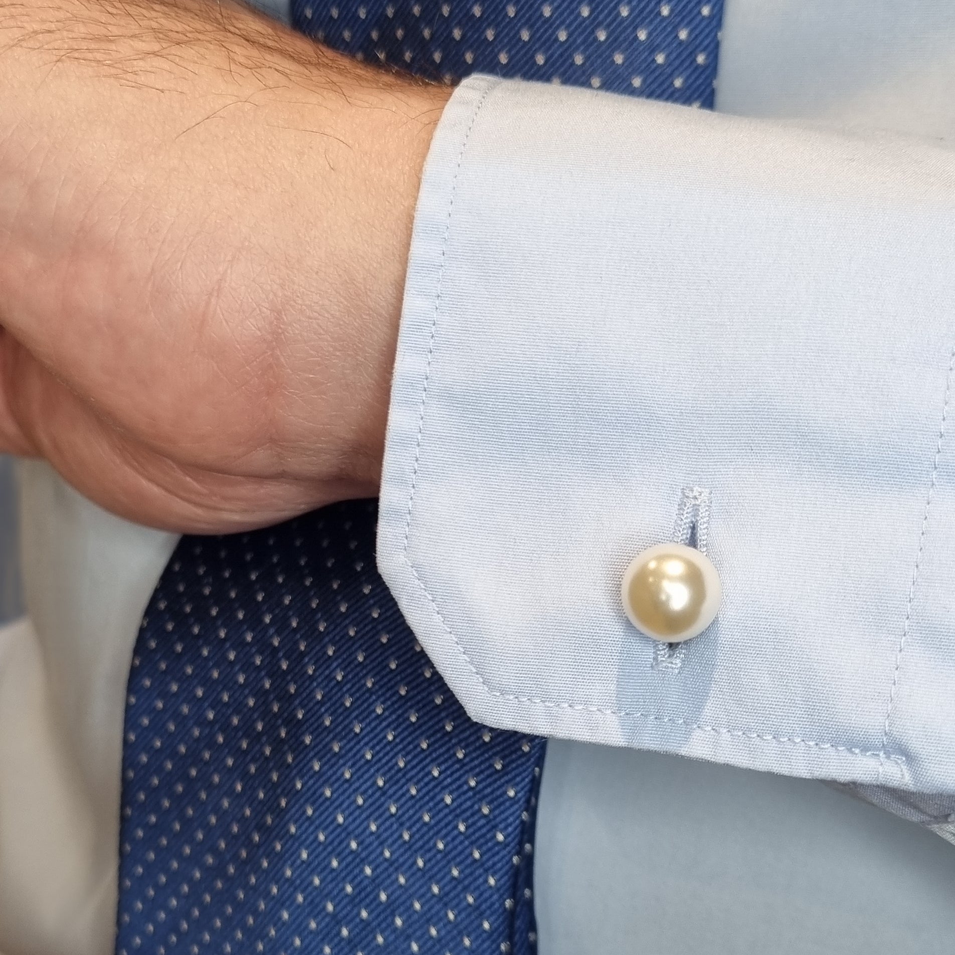 Silver toned metal pearl cufflinks